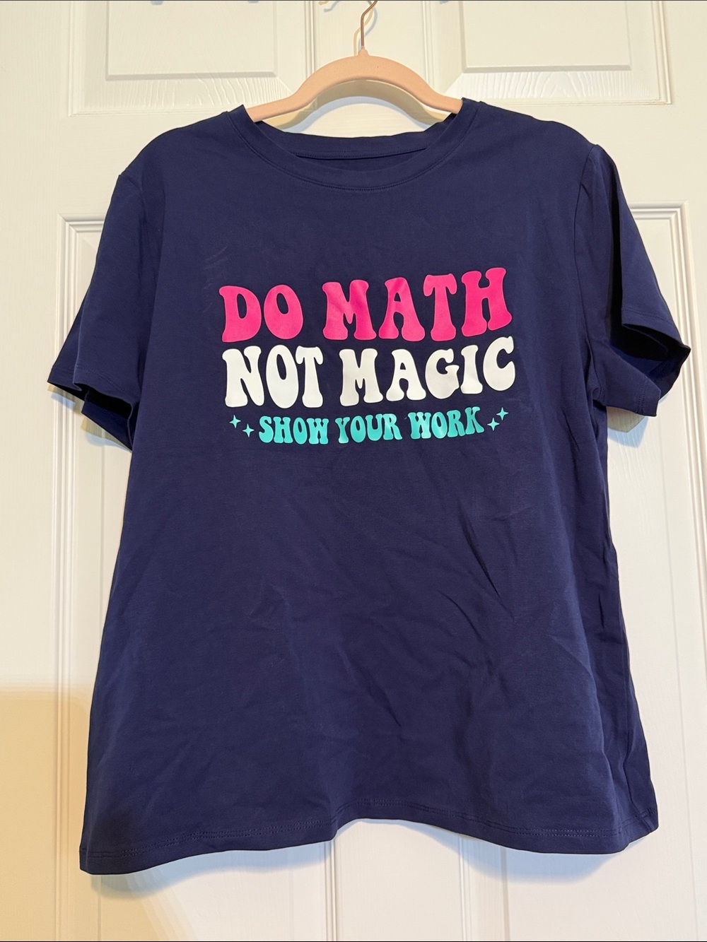 a new day Navy Graphic Tee with “Do Math Not Magic”